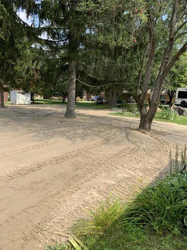 Custom yard maintenance for year-round maintenance in Richmond, MI by Mid Thumb Land Development