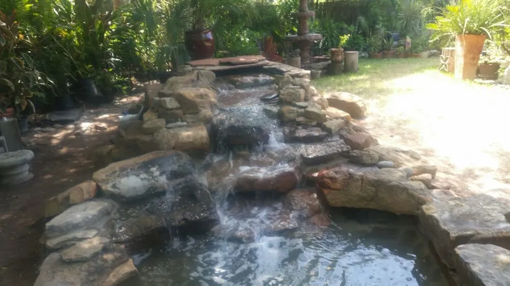 Affordable landscape design with custom design across Alamo, TX - Mid Valley Landscape and Pond Creations