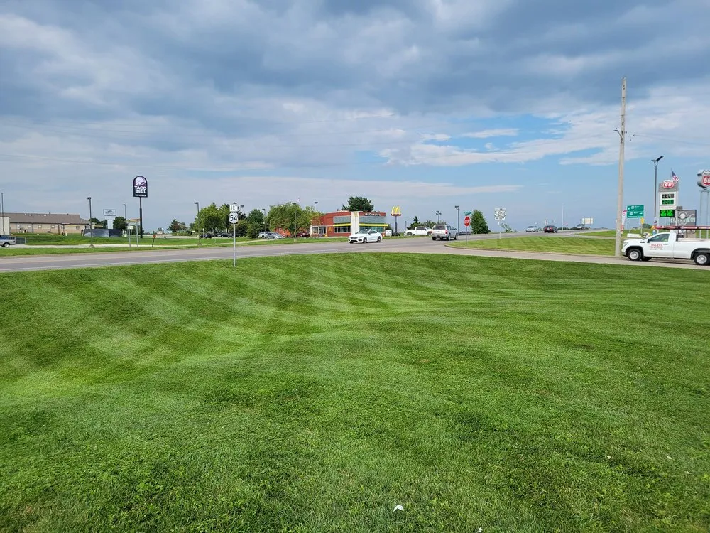 Custom landscape installation with custom design across Columbia, MO - Midgard Mowing