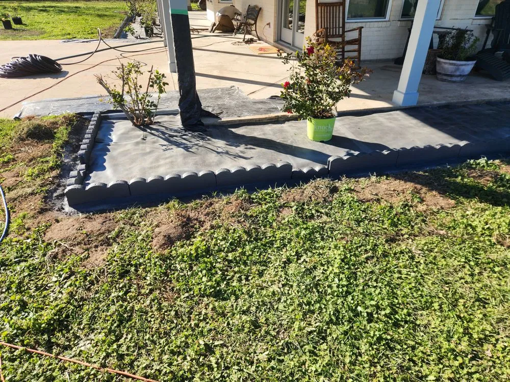 Custom yard cleanup service for year-round maintenance in Columbus, TX by Midway Water Gardens