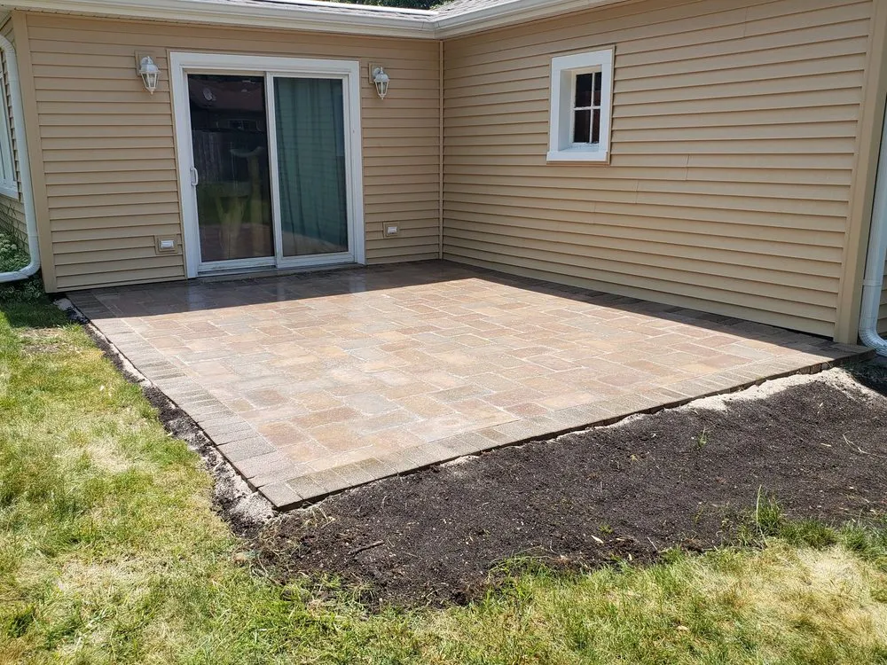 Custom landscape installation for beautiful yards in Mundelein, IL by Midwest Pond Design