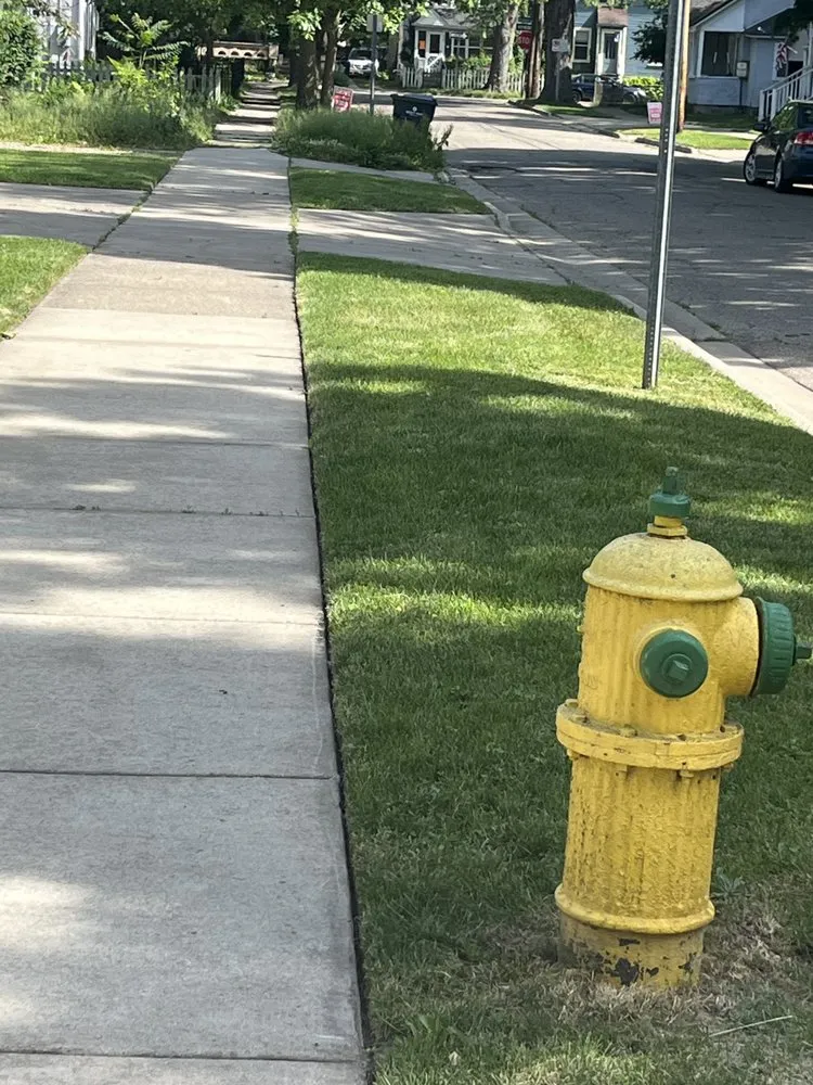 Expert lawn mowing service for residential properties across Kalamazoo, MI - Miggy’s Machines