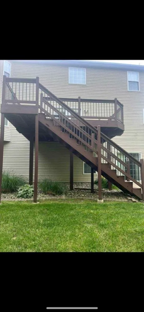 Professional lawn care service for residential properties in Litchfield, IL by Mighty Handz Does It All