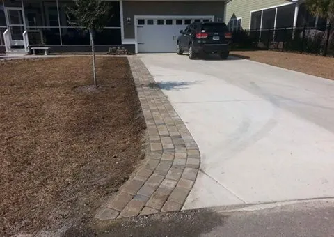 Affordable lawn care service for residential properties in Saint George, SC by Mighty Mow Landscaping & Lawn Care