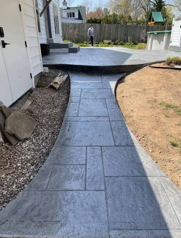 Expert yard cleanup service for homes across Charlotte, NC - Mighty Rock Concrete