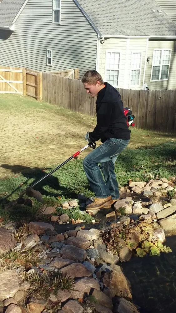 Professional yard cleanup service for residential properties in Raleigh, NC by Mike & Mike's Lawn Care Service