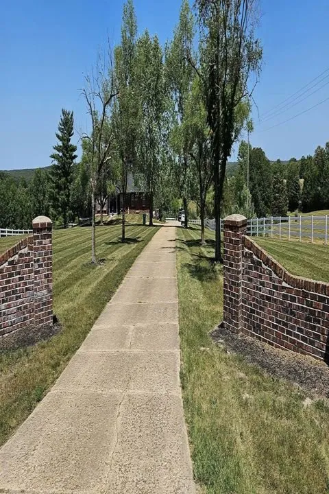 Professional lawn mowing service in Cuba, MO by Mike and Sons Land Care