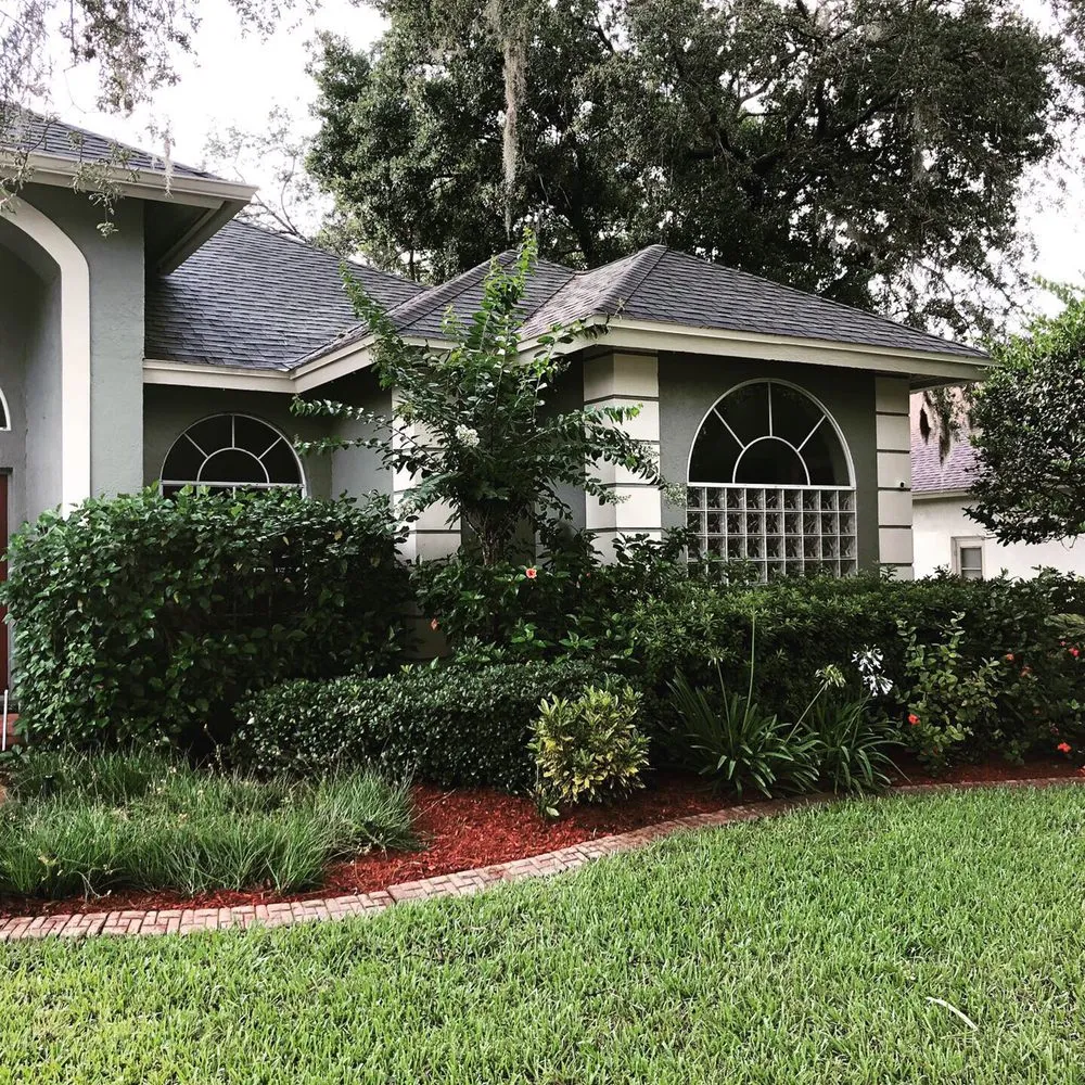 Professional residential landscaping for residential properties in Brandon, FL by Mike Goodwine's lawn Service