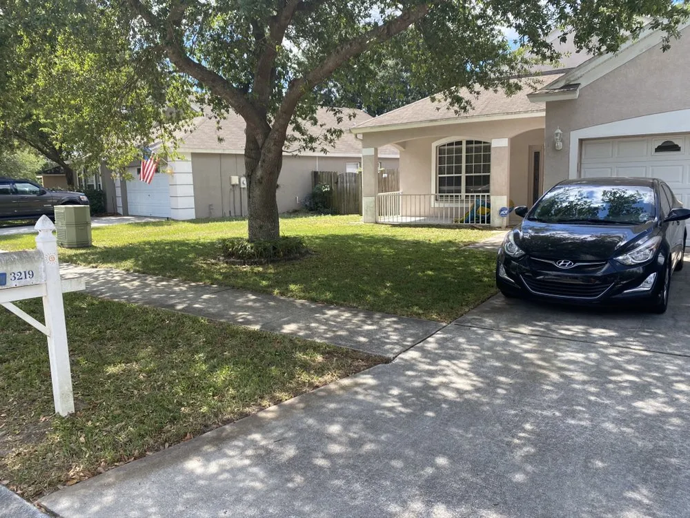 Custom landscape design for homes in Brandon, FL by Mike Goodwine's lawn Service