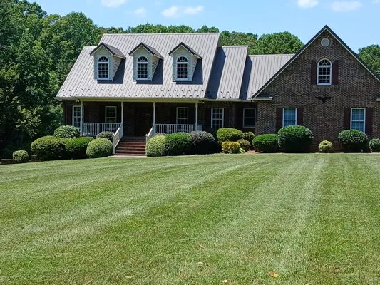 Mike Jones Lawncare Logo