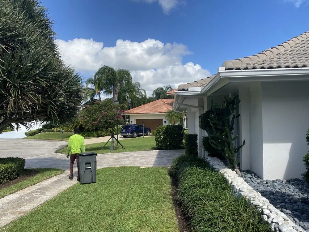 Reliable yard cleanup service with custom design in Boynton Beach, FL by Mikell Gardens Lawn Service, Landscape and Tree Service