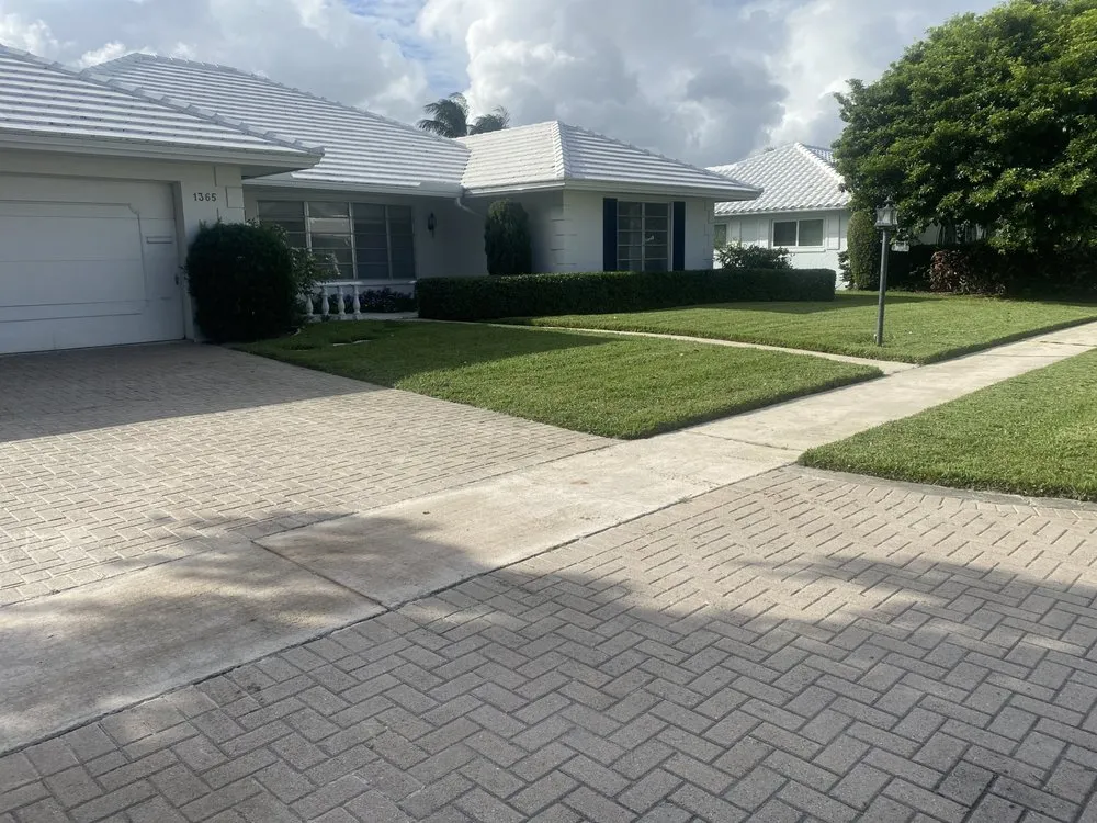 Expert yard cleanup service for beautiful yards in Boynton Beach, FL by Mikell Gardens Lawn Service, Landscape and Tree Service