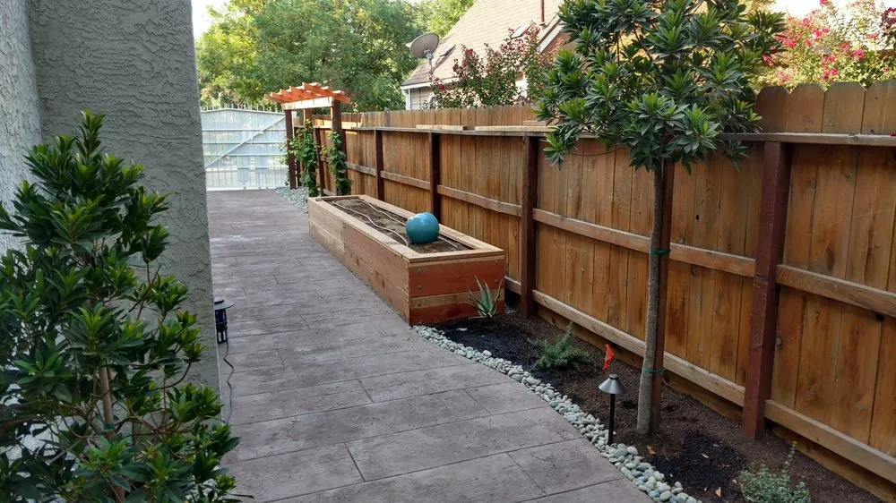 Professional landscaping services with custom design in Clovis, CA by Mike's Evergreen