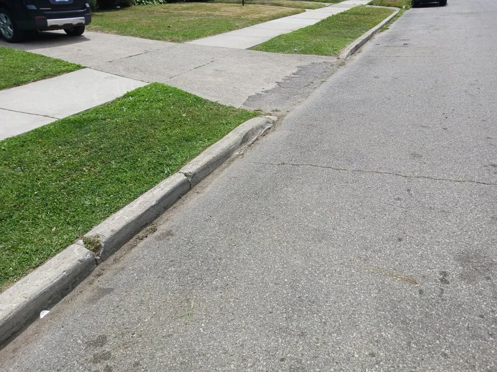 Reliable lawn mowing service for homes in Hamtramck, MI by Mike's Grass Seed