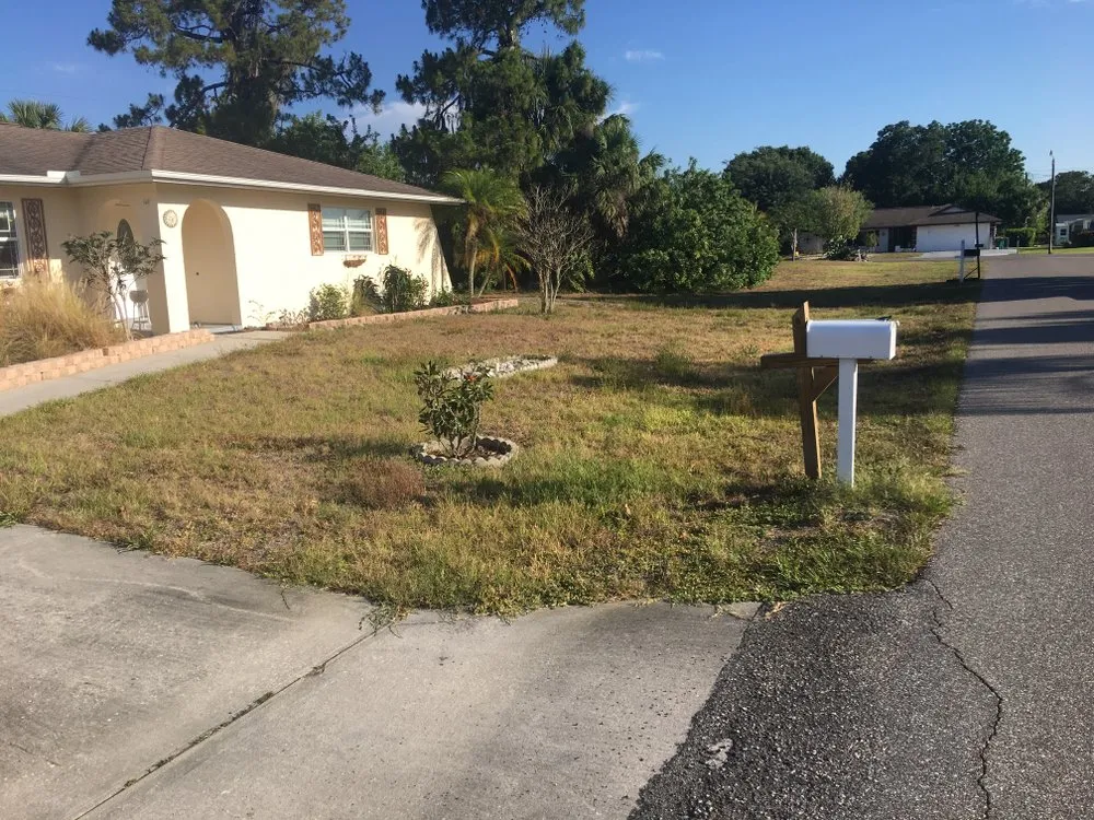 Expert lawn mowing service for residential properties across Port Charlotte, FL - Mike’s Lawn Service