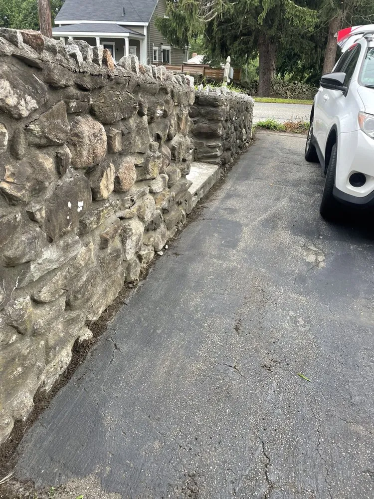 Professional lawn care service for residential properties in Methuen, MA by Mikes Mowing