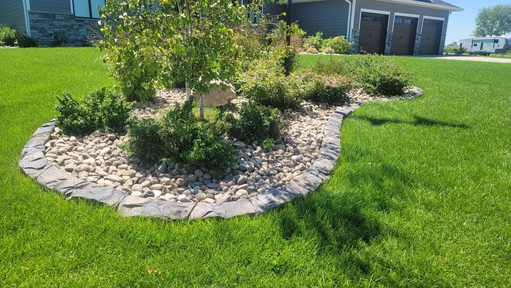 Affordable lawn mowing service with custom design across Grand Island, NE - Miles Lawn & Landscaping