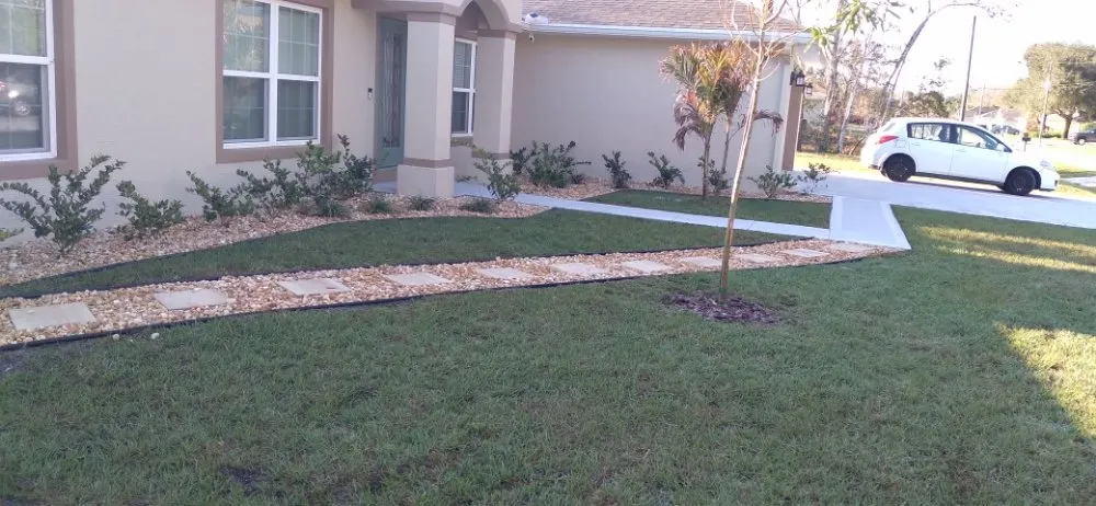 Custom outdoor landscaping for year-round maintenance in Palm Coast, FL by Milici Landscaping