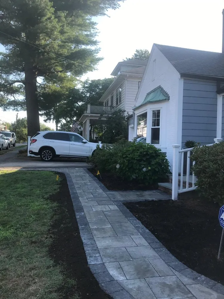 Local garden landscaping with custom design in Boston, MA by Millenium Fence Construction & Landscaping