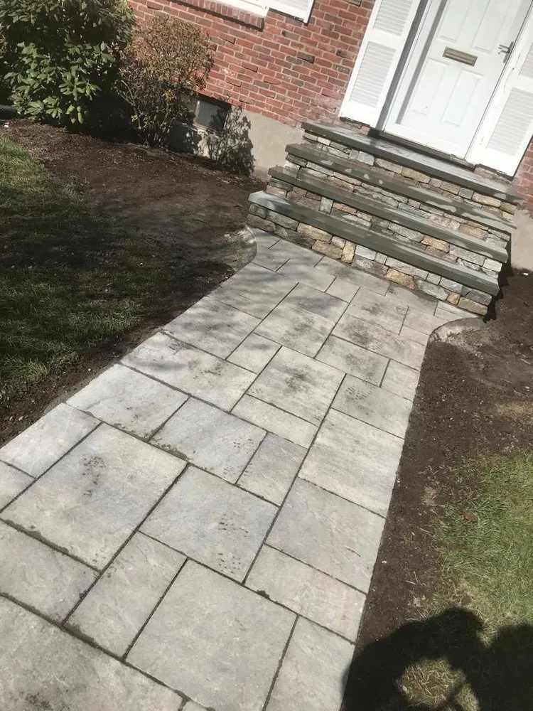 Professional garden landscaping for residential properties in Boston, MA by Millenium Fence Construction & Landscaping