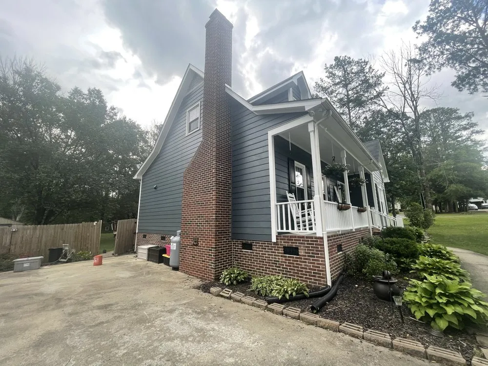 Professional lawn mowing service with custom design in Stem, NC by Millennium landscaping & Home Improvments