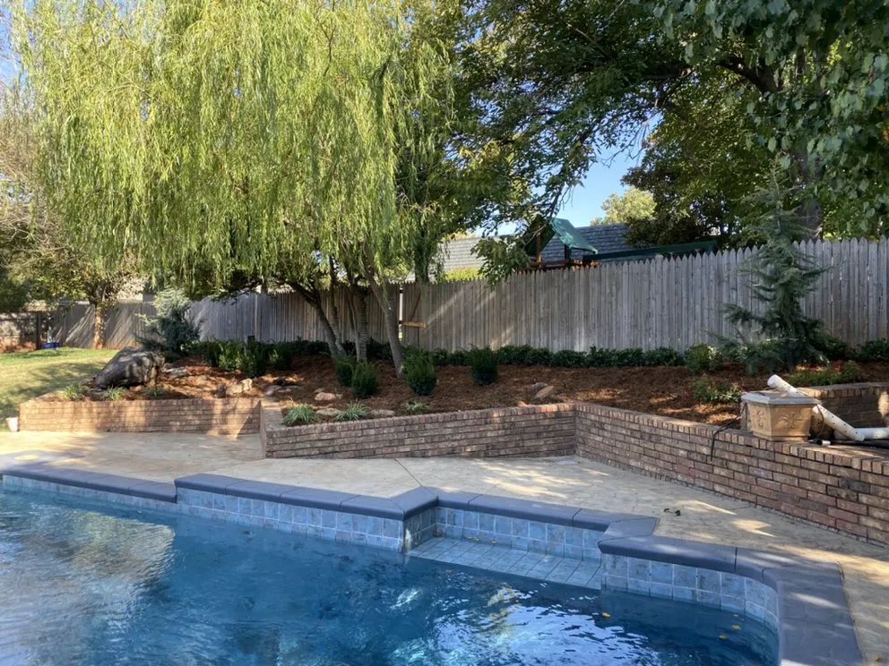 Custom yard maintenance for beautiful yards across Guthrie, OK - Miller's Lawns and Scapes