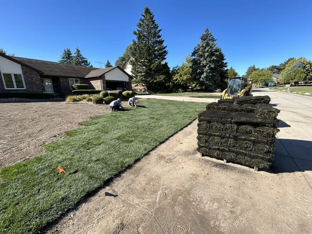 Custom outdoor landscaping in New Hudson, MI by Miller's Property Service