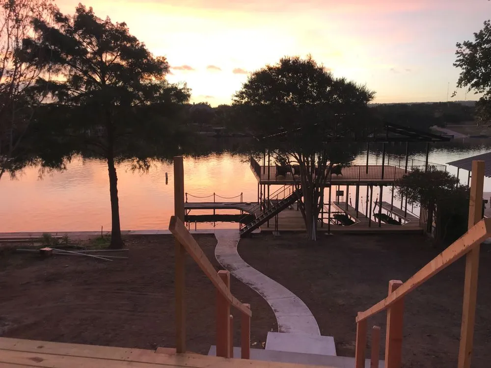 Custom outdoor landscaping for residential properties in Kingsland, TX by Mills Services