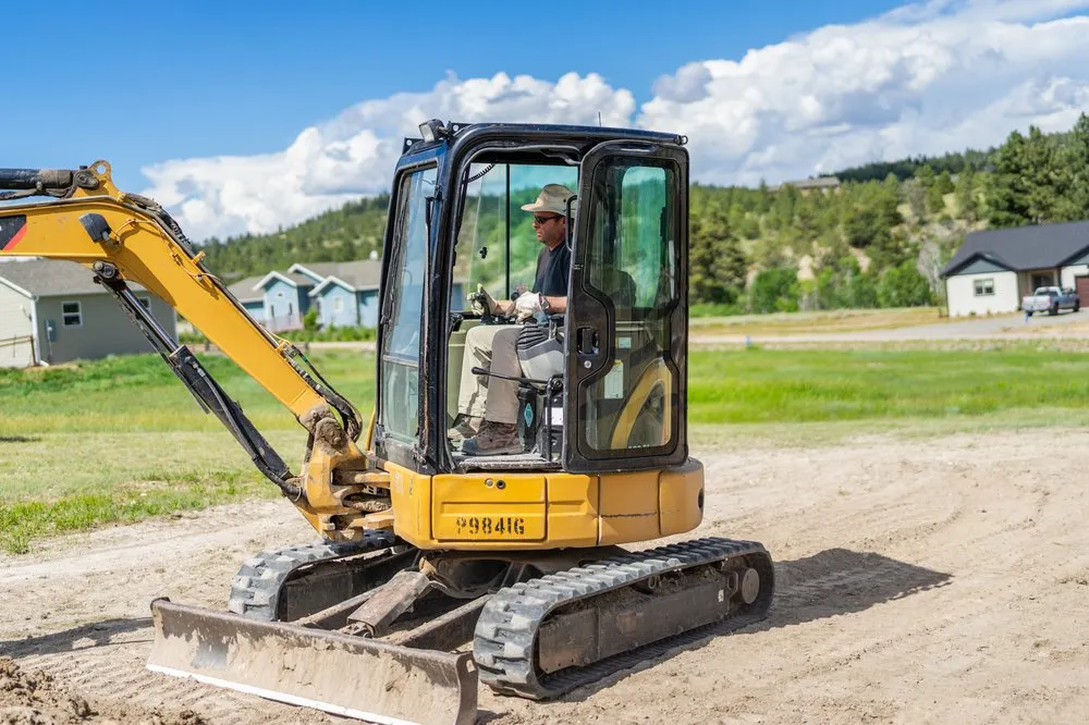 Expert yard maintenance for homes in Bozeman, MT by Mini Digger Services