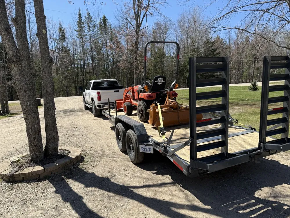 Expert lawn care service for residential properties across Manistique, MI - Mini Earthworks