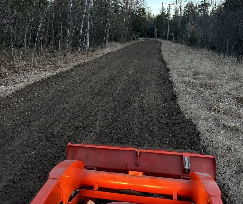 Expert yard maintenance in Manistique, MI by Mini Earthworks