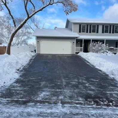 Custom lawn mowing service for year-round maintenance across Burnsville, MN - Minnesnowta lawn care