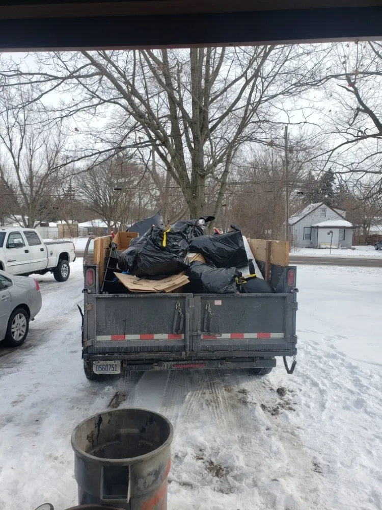 Professional yard cleanup service for year-round maintenance in Lansing, MI by Miracle property maintenance