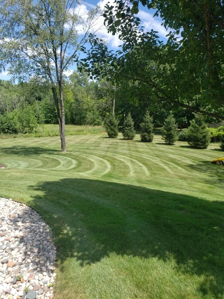 Reliable lawn mowing service for residential properties across Lansing, MI - Miracle property maintenance
