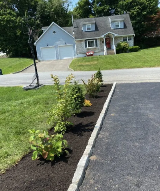 Trusted landscape design with custom design in Wilmington, MA by Miranda’s Snow Lawn Care