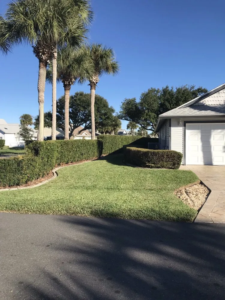 Affordable garden landscaping for homes in Palm Coast, FL by Mistletoe Trimming And Weeding service