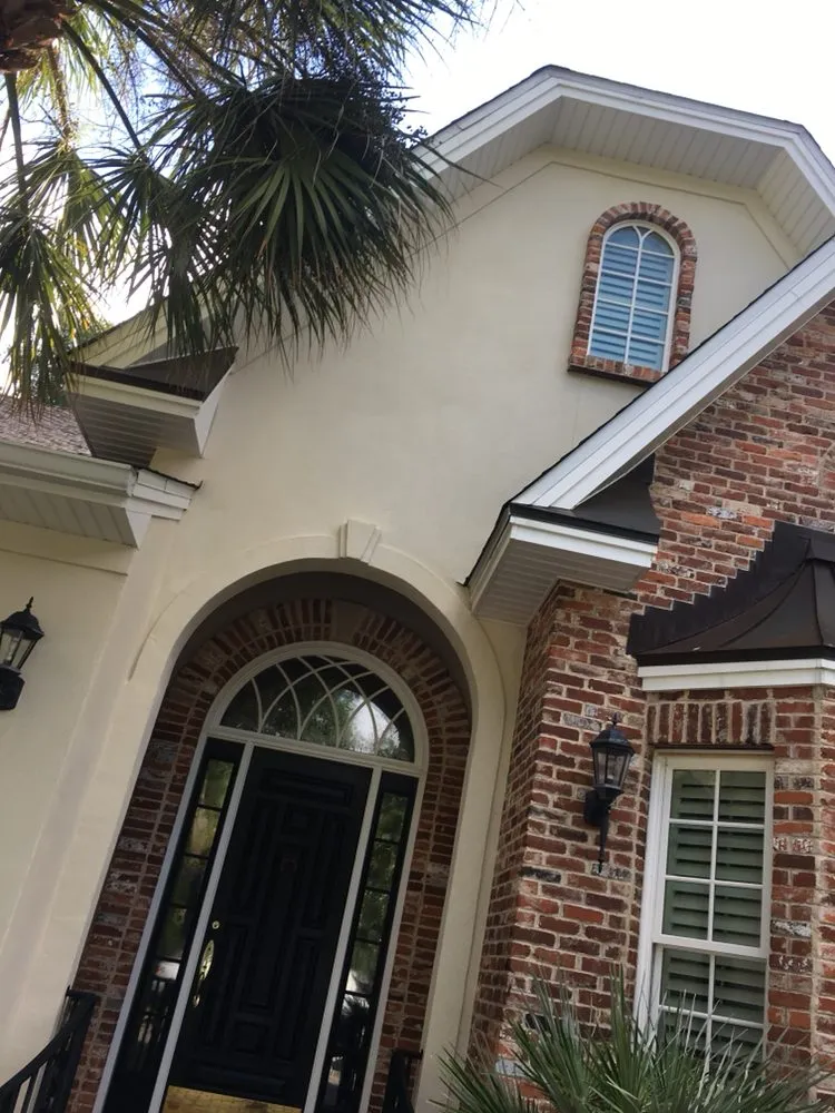 Professional lawn care service for residential properties across Brunswick, GA - Mitch Pressure Washing Plus Cement Treatment