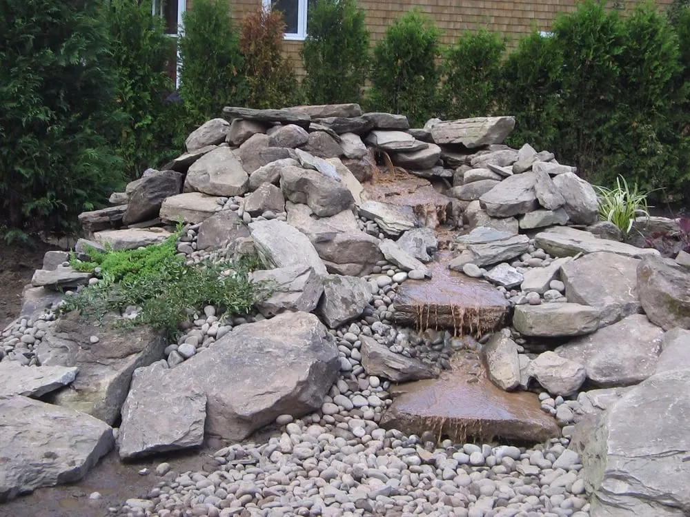 Expert lawn mowing service for year-round maintenance in Bristol, RI by MJ Construction & Landscaping Services