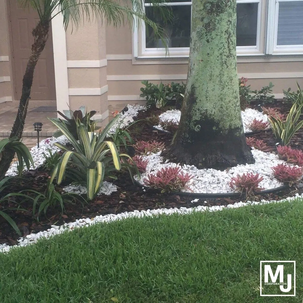 Affordable lawn care service with custom design across Coral Springs, FL - M&J Corporation