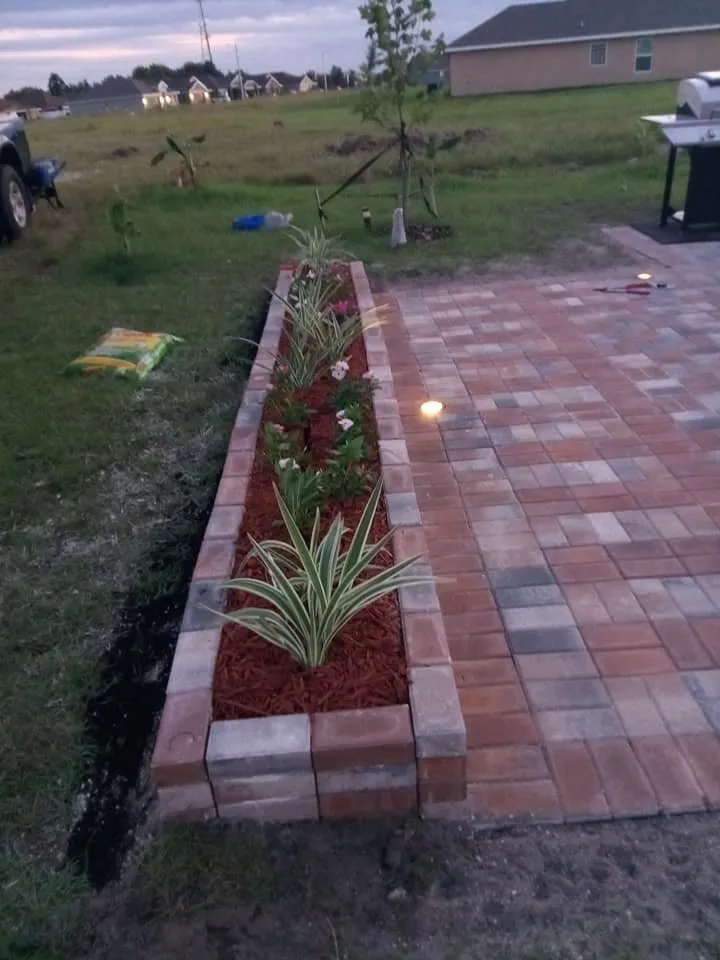 Custom outdoor landscaping with custom design in Bradenton, FL by MJ Landscape and Maintenance