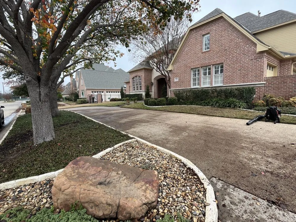 Professional lawn mowing service for residential properties across Garland, TX - MJ Lawn Care and Gutter Service