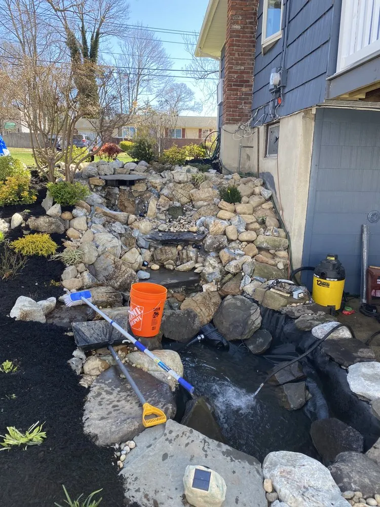 Local lawn care service for year-round maintenance in Huntington Station, NY by Mj New Vision Landscaping