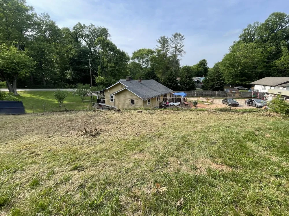 Trusted lawn mowing service for residential properties in Hendersonville, NC by MJA Landscaping