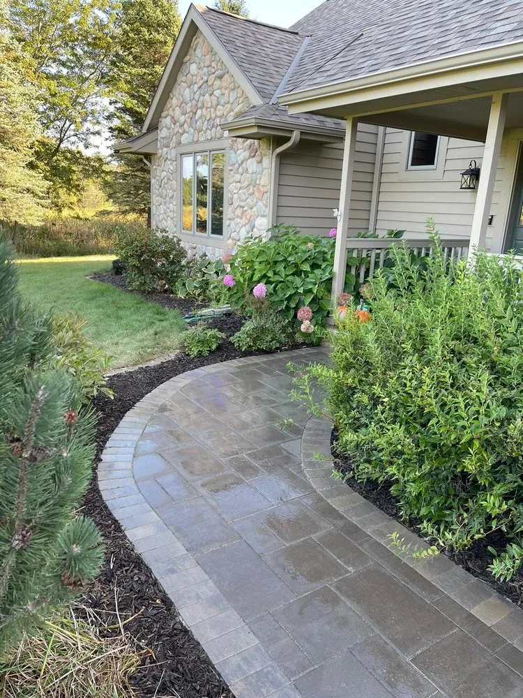 Reliable lawn care service with custom design in Oconomowoc, WI by MJD Landscaping