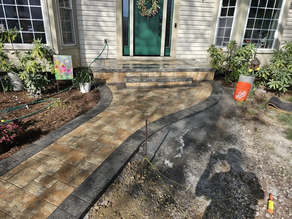 Expert lawn mowing service for outdoor upgrades in Leesburg, VA by MJD Paving & Masonry