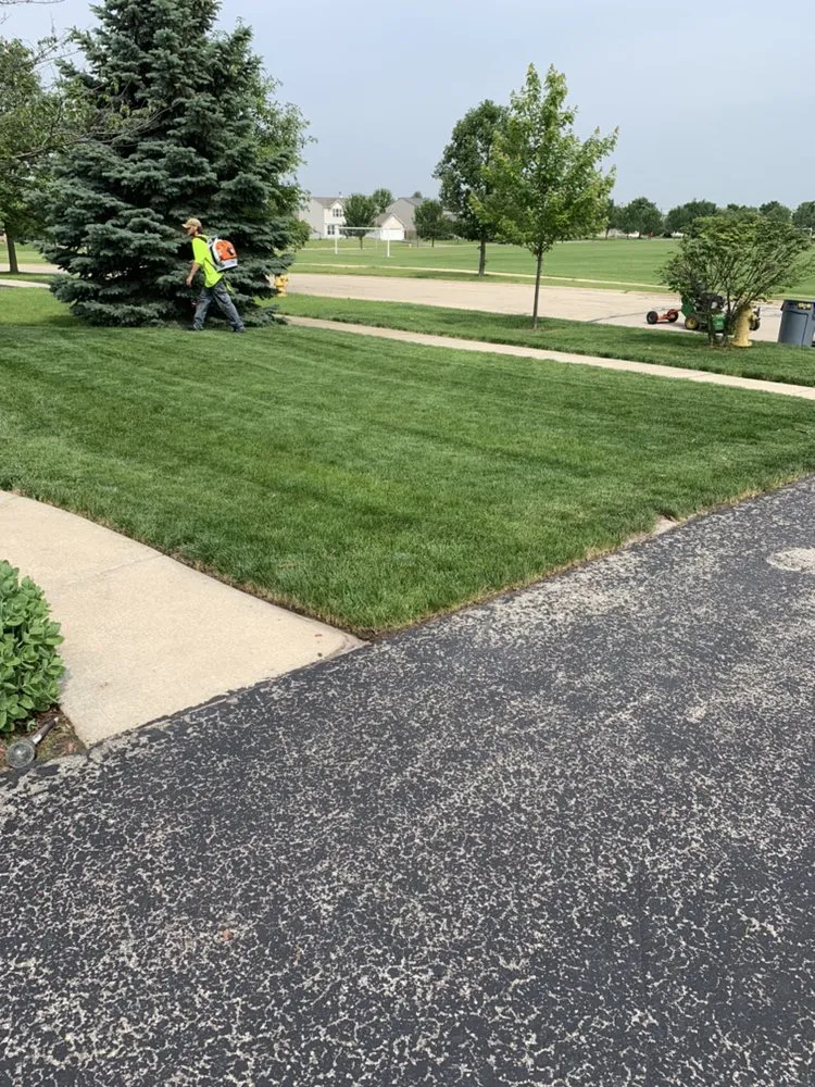 Custom landscape design for year-round maintenance in Joliet, IL by MJs Lawncare