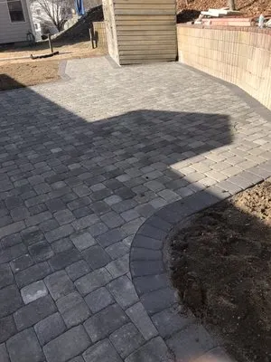 M&L Landscaping Construction Logo