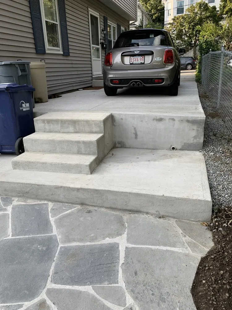Local yard cleanup service for residential properties across Dorchester, MA - M&M Construction Landscaping and Masonry
