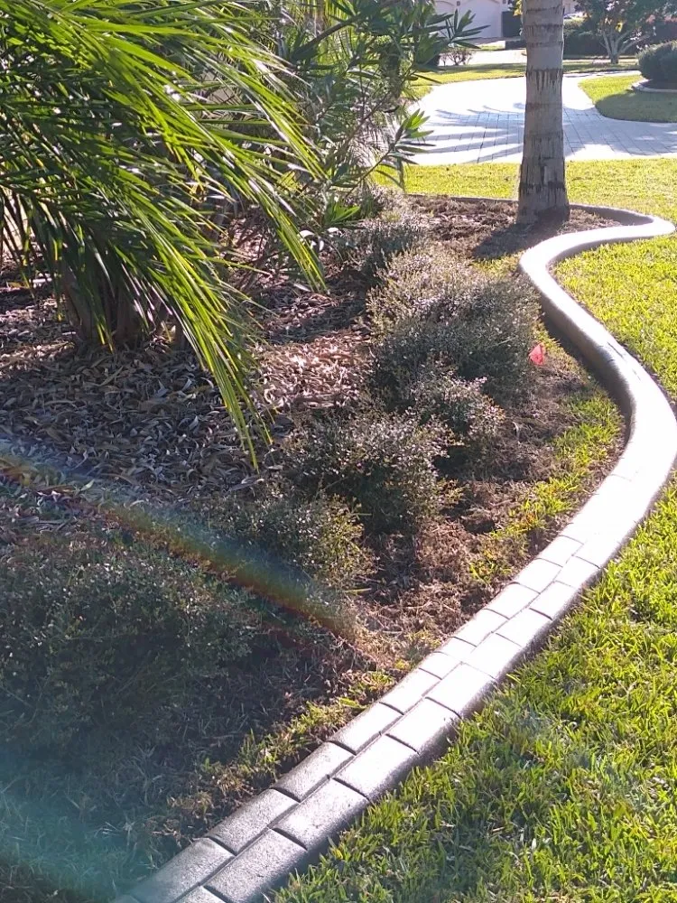 Top-rated lawn mowing service in Port Orange, FL by M&M Curbing and Landscaping