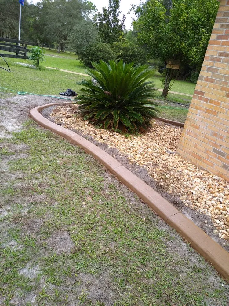 Expert yard cleanup service for residential properties in Port Orange, FL by M&M Curbing and Landscaping